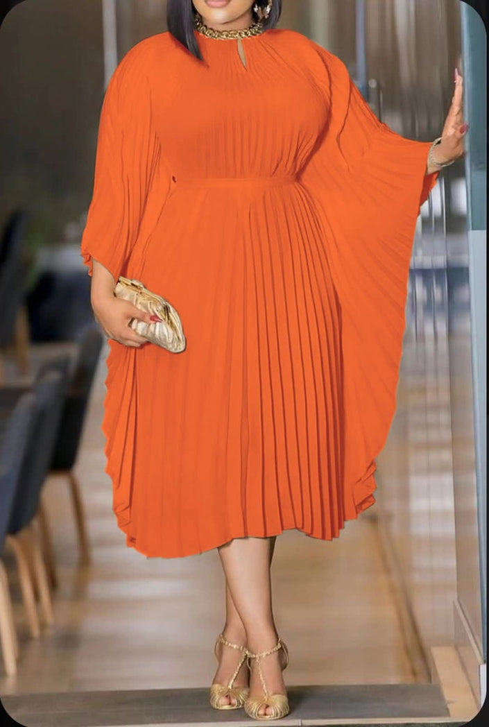 Pleated midi dress in orange with gathered neckline and long flared sleeves.