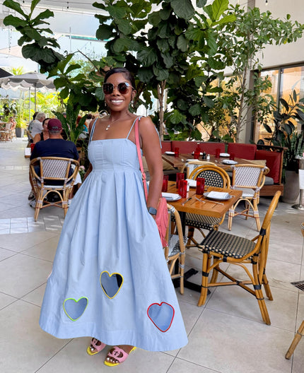 Light blue midi dress with spaghetti straps and contrast heart cutouts