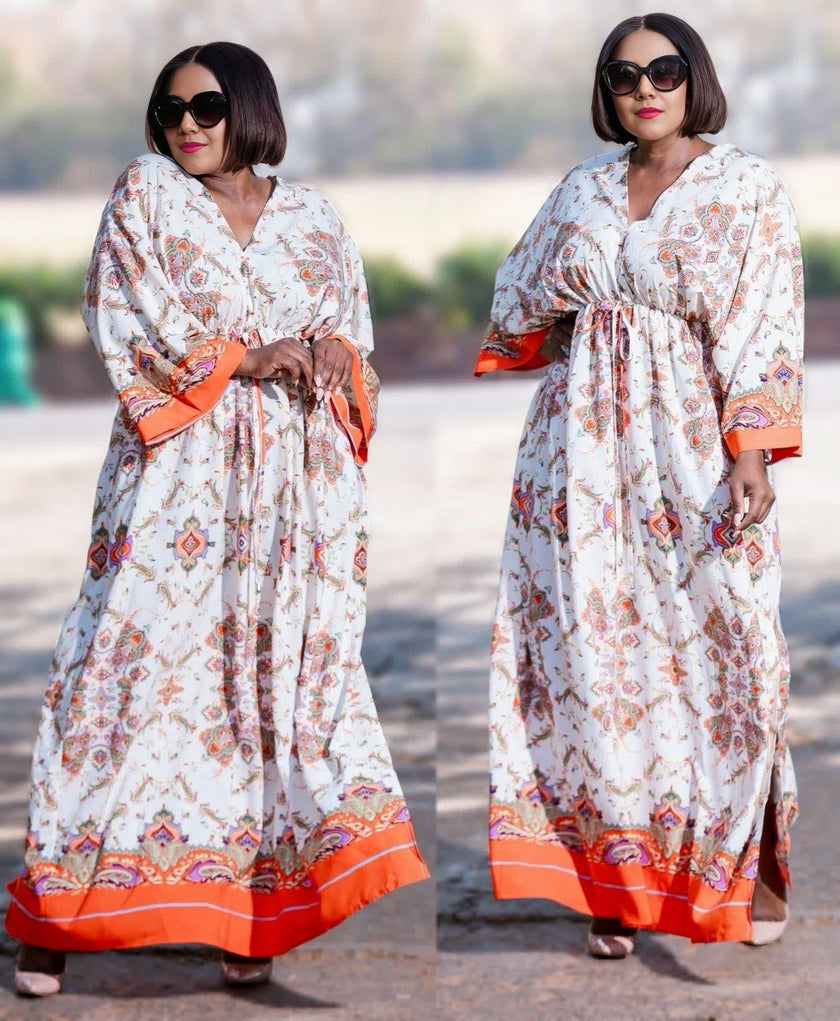Maxi dress with geometric floral print, long sleeves, V-neck, orange hem border