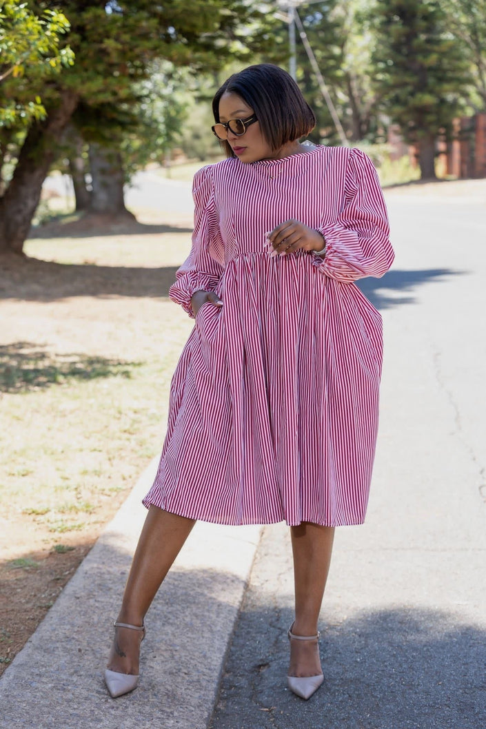 Purple striped puff-sleeve dress with gathered waist and knee-length skirt