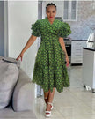 Green printed midi dress with ruffle sleeves V-neck and pleated skirt