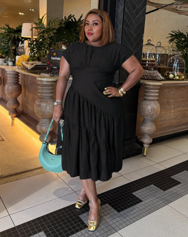 Black tiered midi dress with short sleeves and ruching at stretch waist