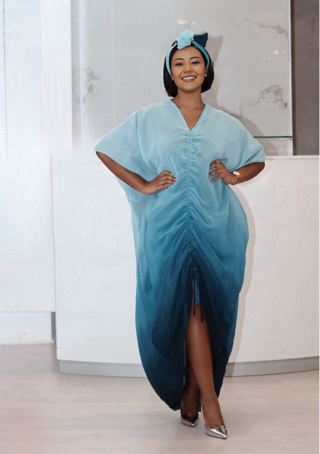Ruched V-neck maxi dress in light blue with short sleeves and side slit