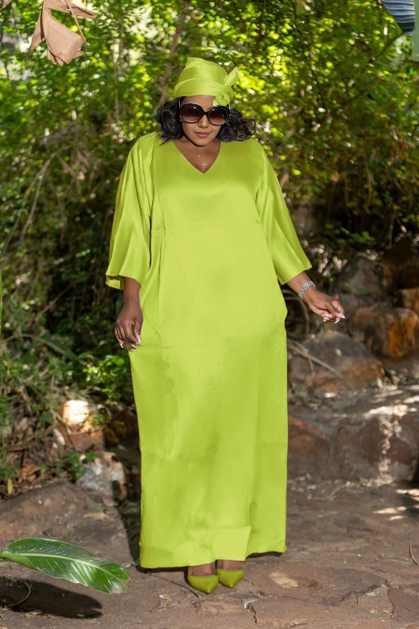 Lime green loose-fit maxi dress with V-neck and wide elbow-length sleeves