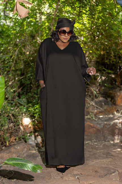 Black loose-fit maxi dress with V-neck and wide elbow-length sleeves