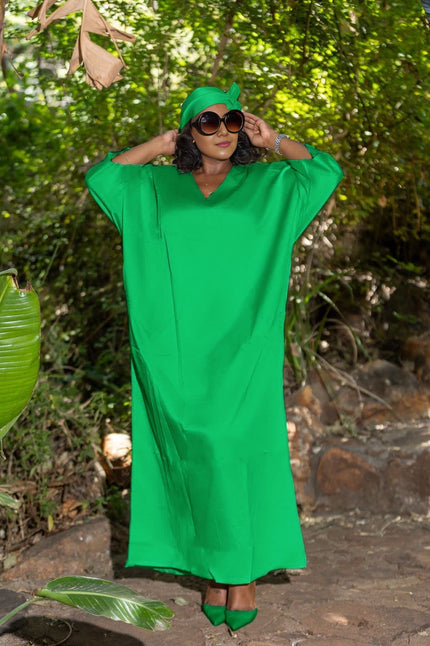 Green loose-fit maxi dress with V-neck and wide elbow-length sleeves