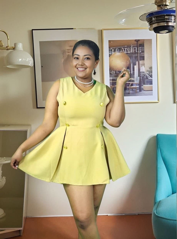 Yellow sleeveless A-line mini dress with double-breasted gold button front