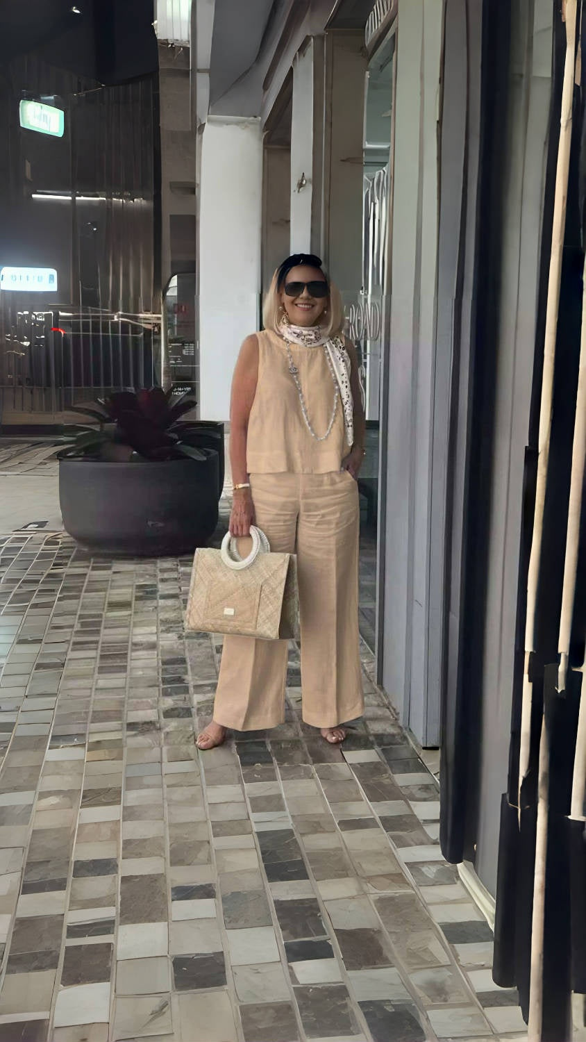 Peach wide-leg trousers with relaxed fit and high waist