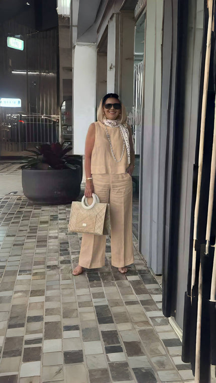 Peach wide-leg trousers with relaxed fit and high waist