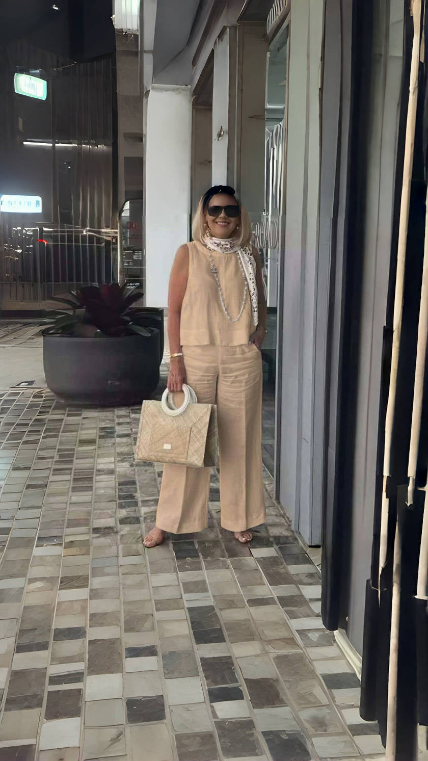 Peach wide-leg trousers with relaxed fit and high waist