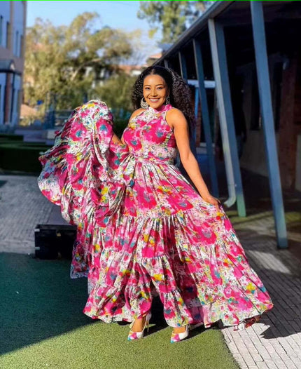 Floral maxi dress, sleeveless pink with tiered ruffle skirt and flowing hem