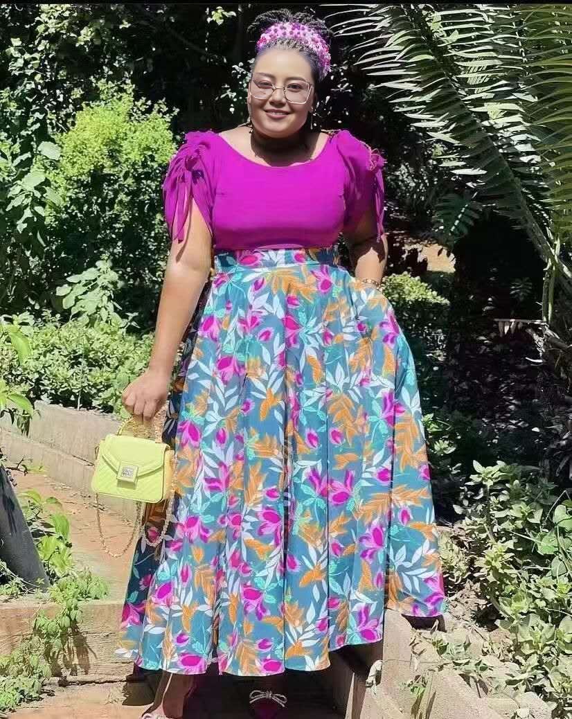 FashionPrice twin set: pink puff-sleeve top with colorful floral tiered skirt