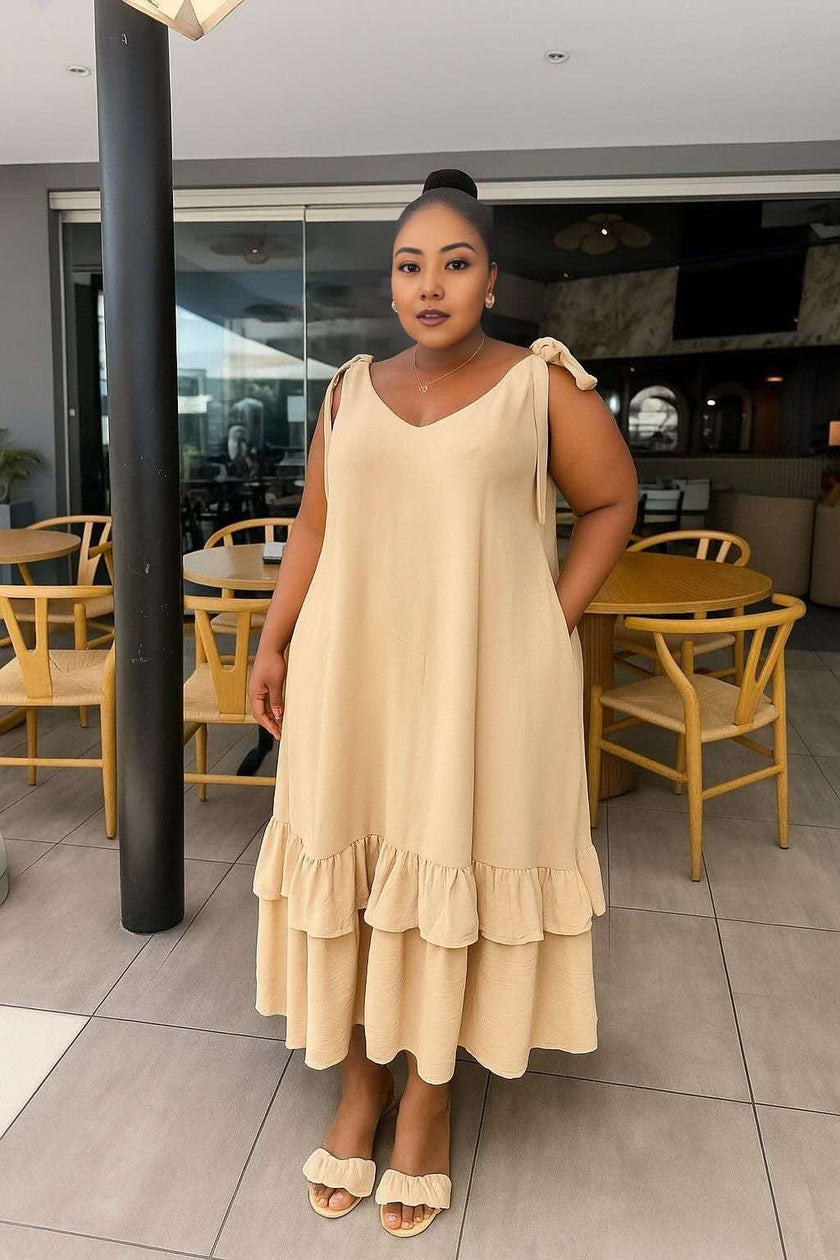 Beige tiered maxi dress with V-neck and tie shoulder straps