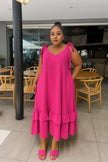 Deep-pink tiered maxi dress with V-neck and tie shoulder straps