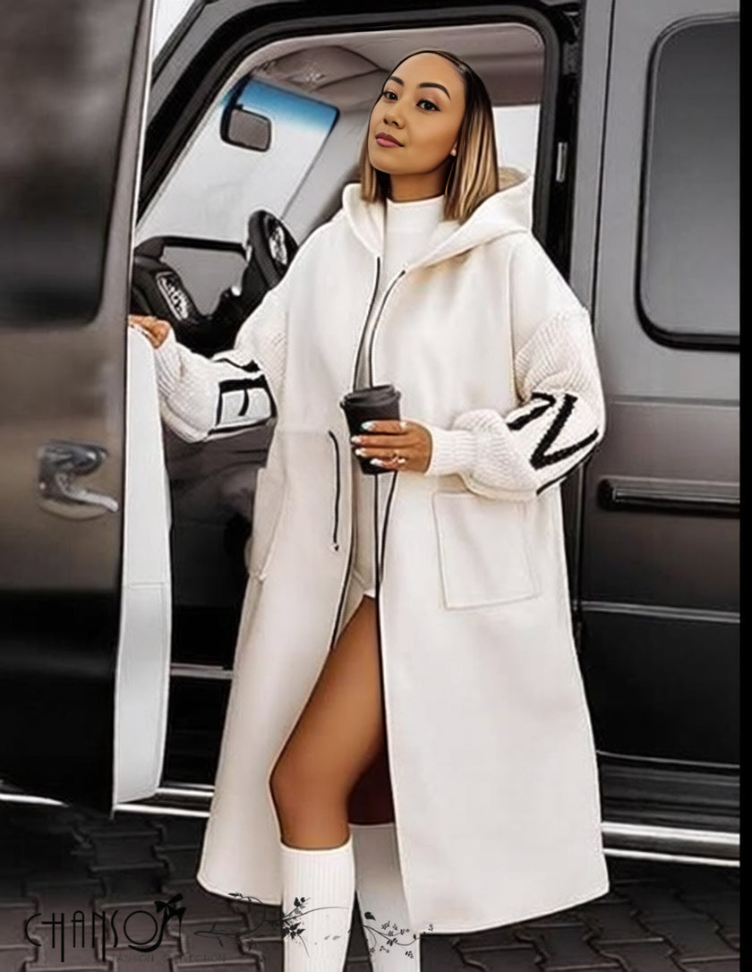 White hooded knit coat with front zipper, long sleeves and geometric sleeve detailing