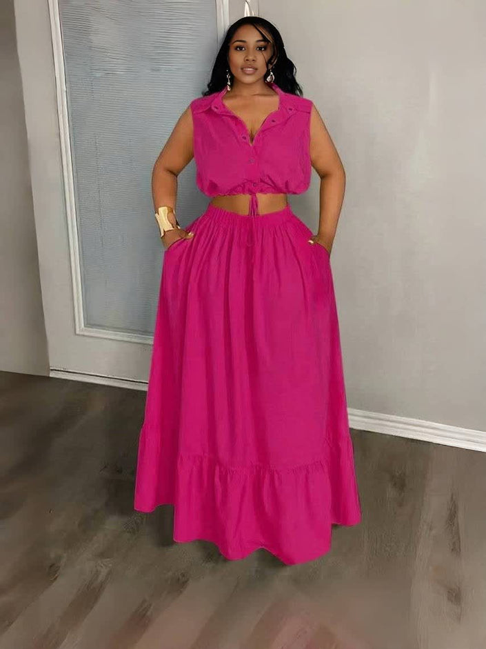 Deep-pink crop top and maxi skirt set with sleeveless button front, tied waist