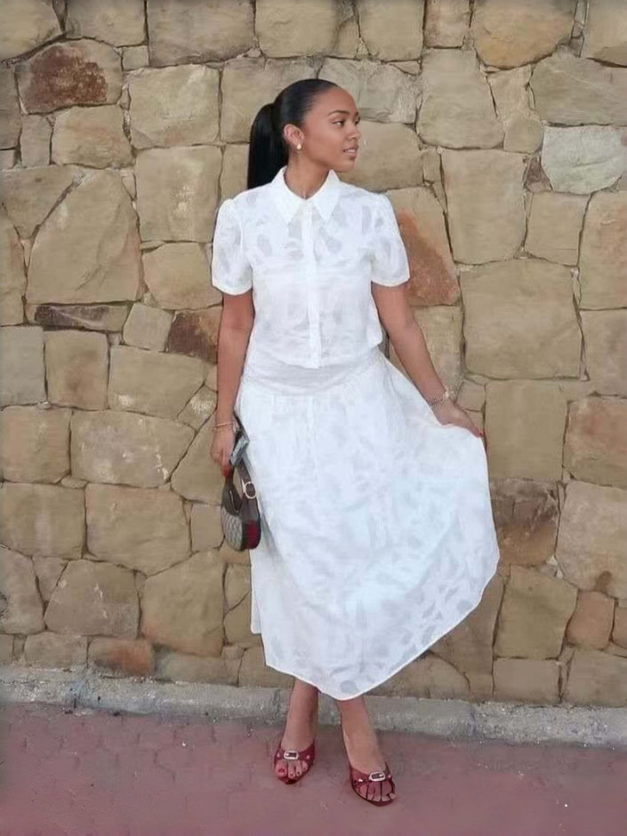 White textured puff-sleeve work set, side view with short-sleeve blouse and midi skirt