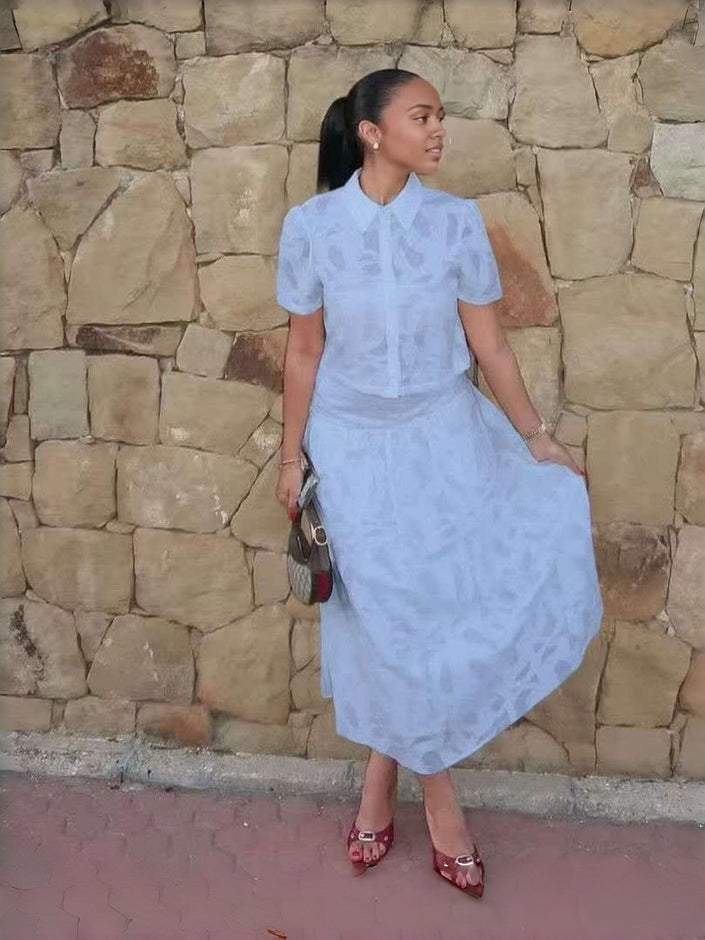 White textured puff-sleeve work set with short-sleeve blouse and midi skirt