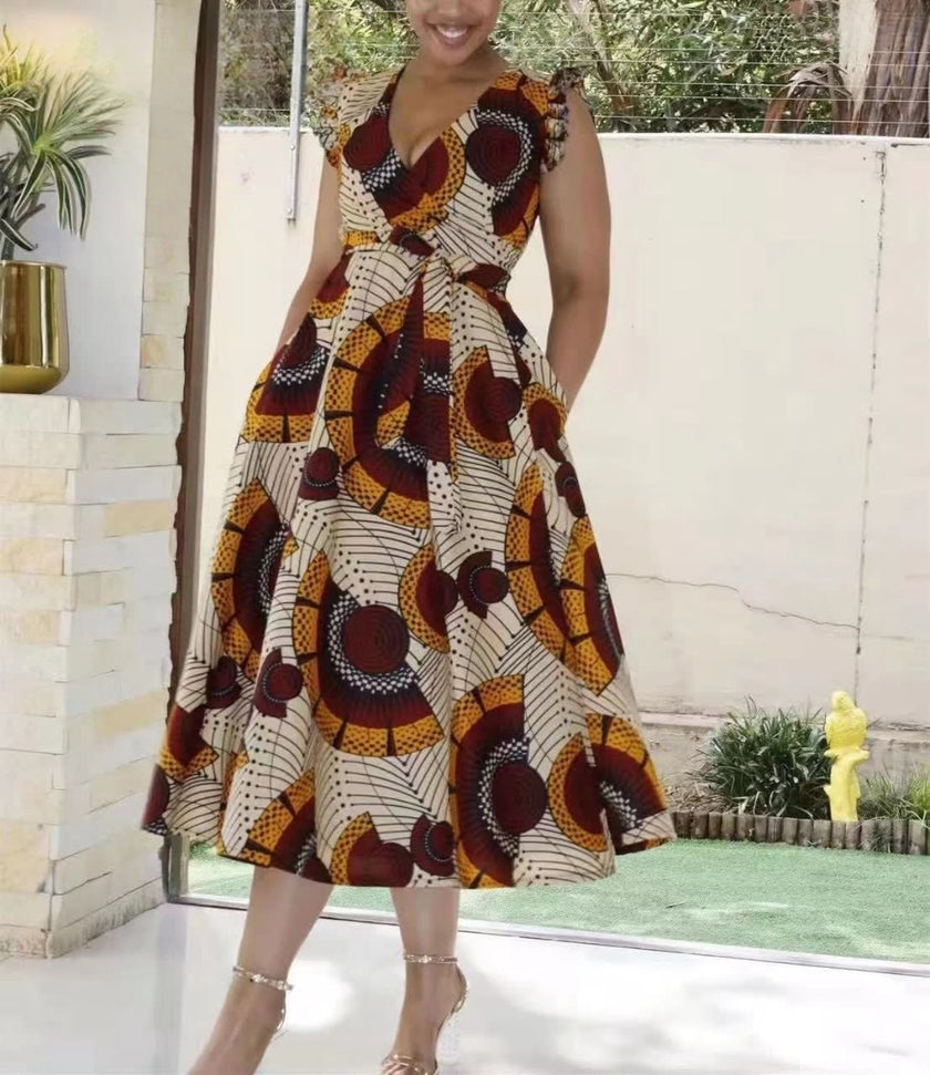 Sleeveless V-neck A-line midi dress with bold African print circles and blocks