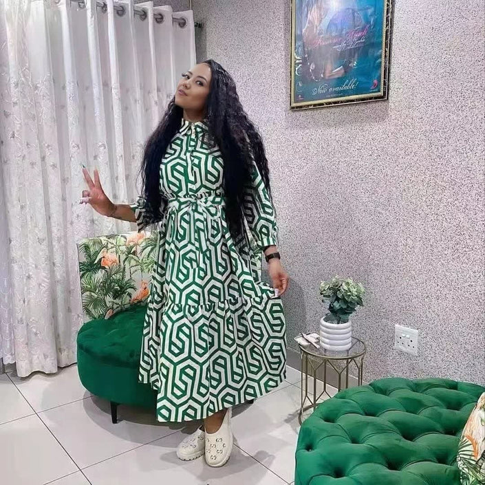 Plus size midi shirt dress with geometric print and waist belt, long sleeves, green
