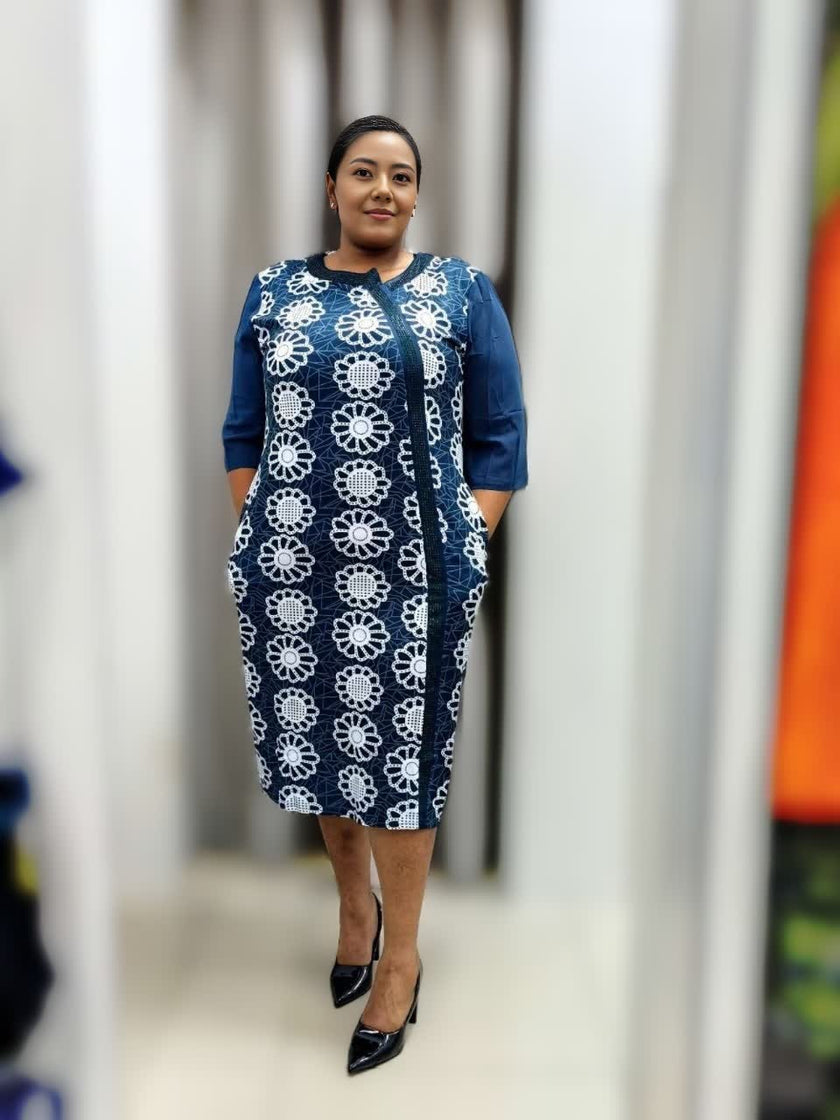 Plus-size floral midi dress, deep-sky-blue with white circle print, 3/4 sleeves