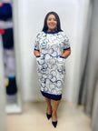 Midi dress with geometric circle print in navy on white, short sleeves, crew neck.