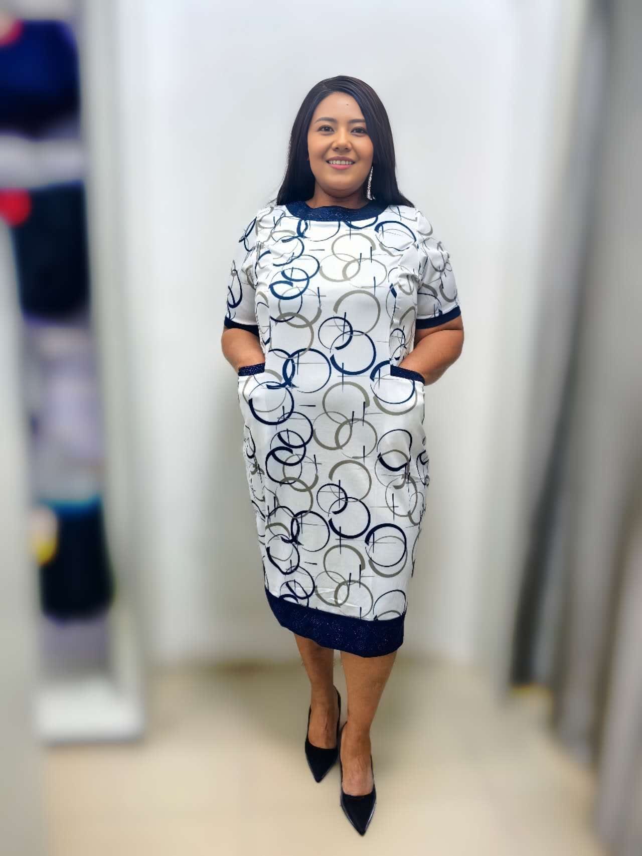Midi dress with geometric circle print in navy on white, short sleeves, crew neck.