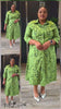 Plus size collared midi dress in green with abstract line print, long sleeves