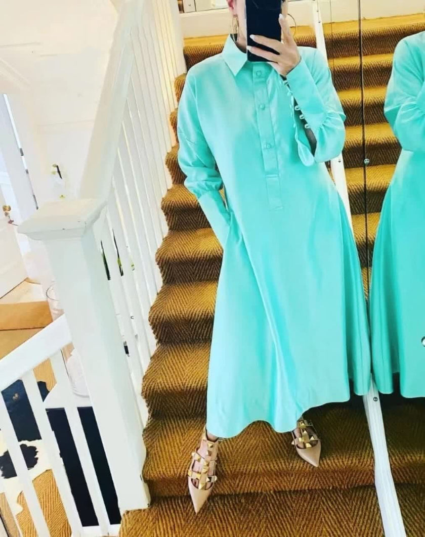 Cyan midi shirt dress with collar, long sleeves, and button-front.