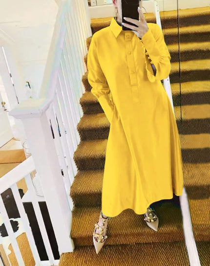 Yellow midi shirt dress with collar and long sleeves, button-front.