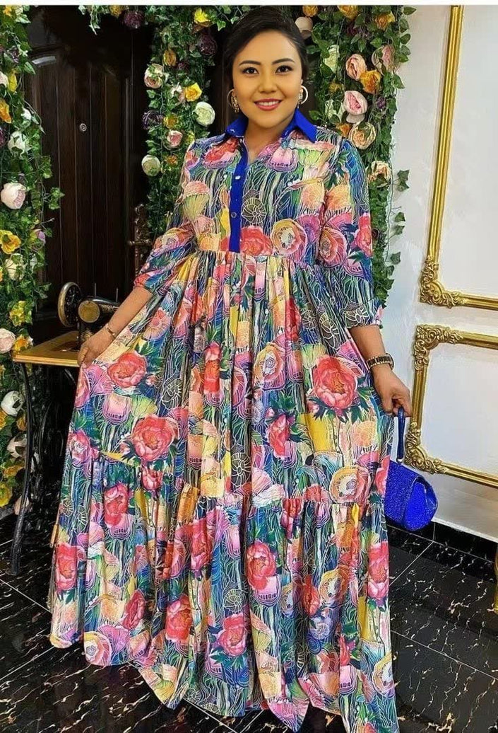 Plus size floral maxi dress with ruffle collar, long sleeves, tiered skirt