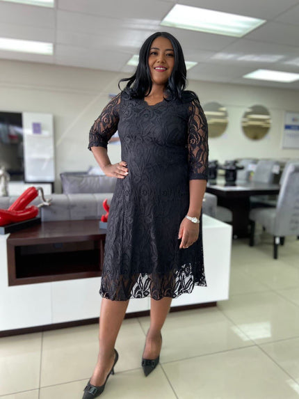 Black lace midi dress with floral overlay, 3/4 sleeves and lace hem