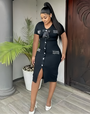 Black knit midi dress with bow neckline, button front and side slit, stretch waist