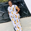 Printed twin set: short-sleeve top and long skirt, white with yellow and dark print