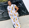 Printed twin set: short-sleeve top and long skirt, white with yellow and dark print