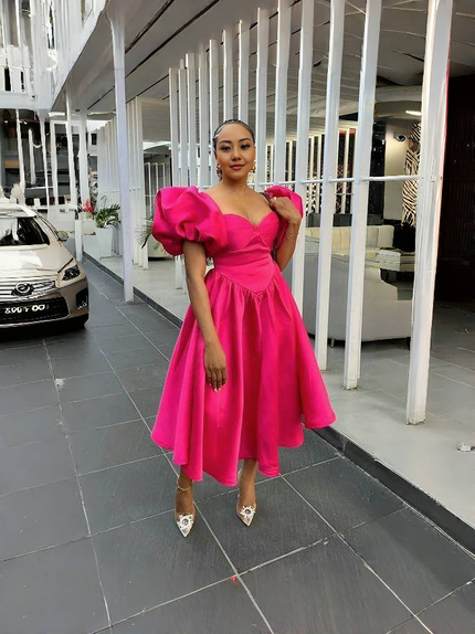 Deep-pink puff-sleeve midi dress with square neckline and gathered waist