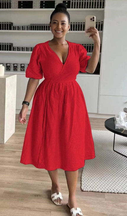 Bright red wrap midi dress with puff sleeves and V-neck, gathered stretch waist