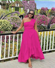 One-shoulder midi dress in deep pink with ruffle hem and fitted bodice