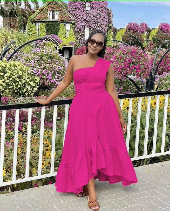 One-shoulder midi dress in deep pink with ruffle hem and fitted bodice
