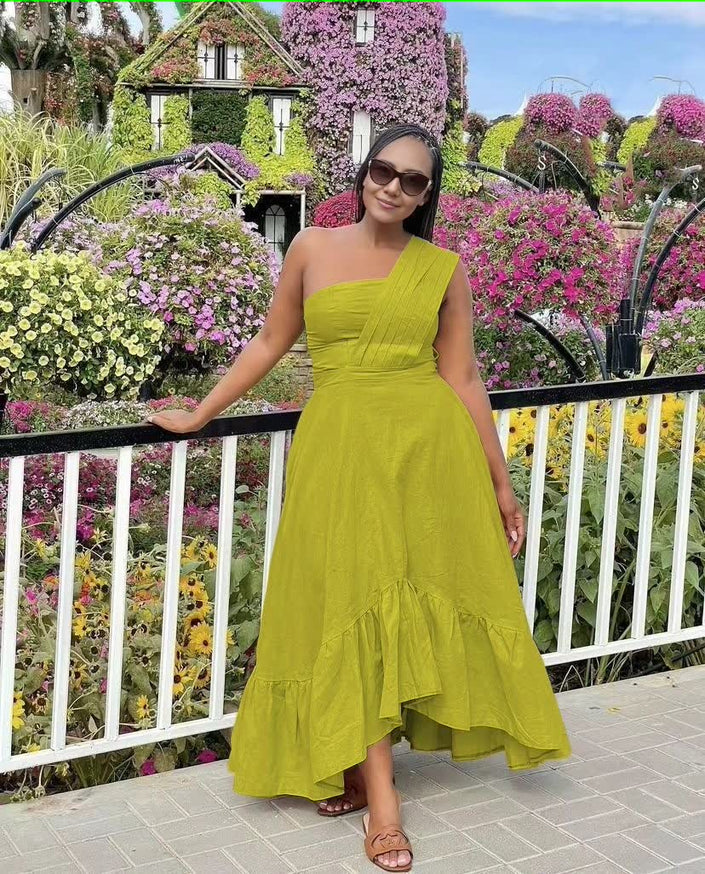One-shoulder midi dress in lime green with ruffle hem and fitted bodice