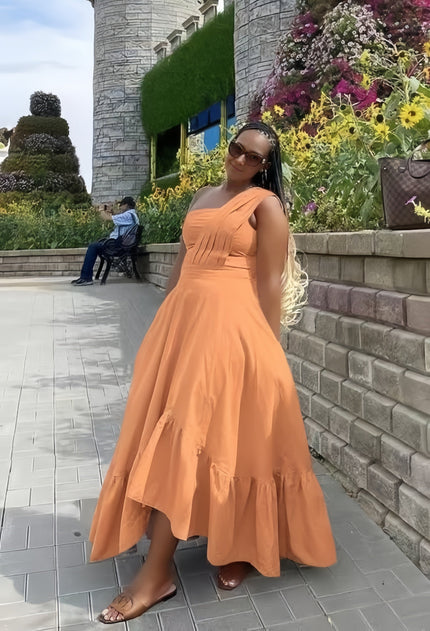 One-shoulder midi dress in orange with ruffle hem and fitted bodice