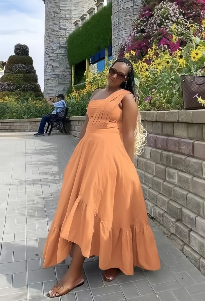 One-shoulder midi dress in orange with ruffle hem and fitted bodice