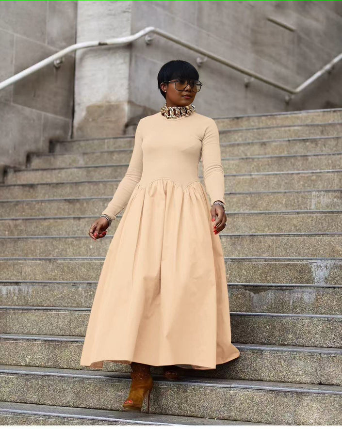Nude maxi dress with long sleeves and gathered A-line skirt