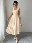 Beige sleeveless midi button-front dress with gathered skirt and waist seams