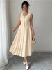 Beige sleeveless midi button-front dress with gathered skirt and waist seams