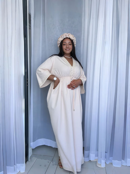 Beige maxi dress with V-neck, decorative button front, wide sleeves and belt tie