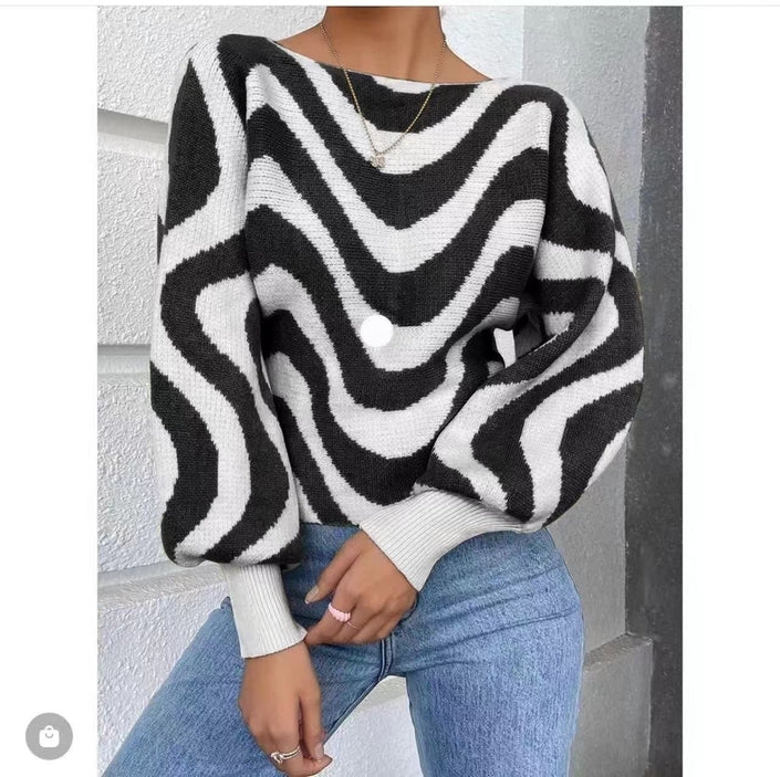 Striped knit top with wide puff sleeves, black and white, loose fit
