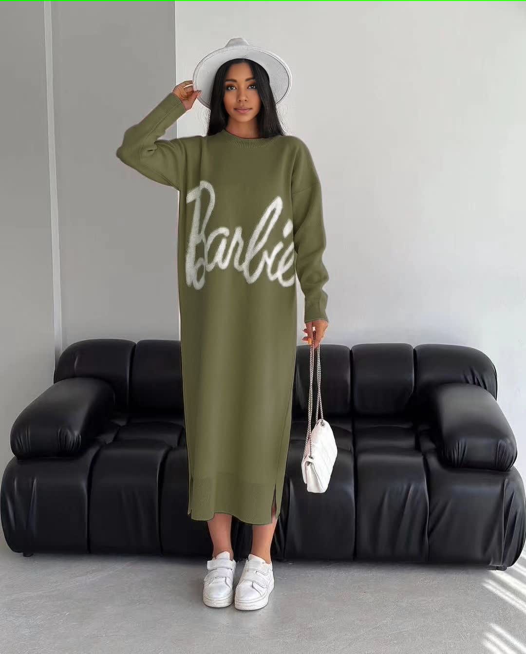 Olive knit maxi dress with long sleeves, round neck, and large script logo