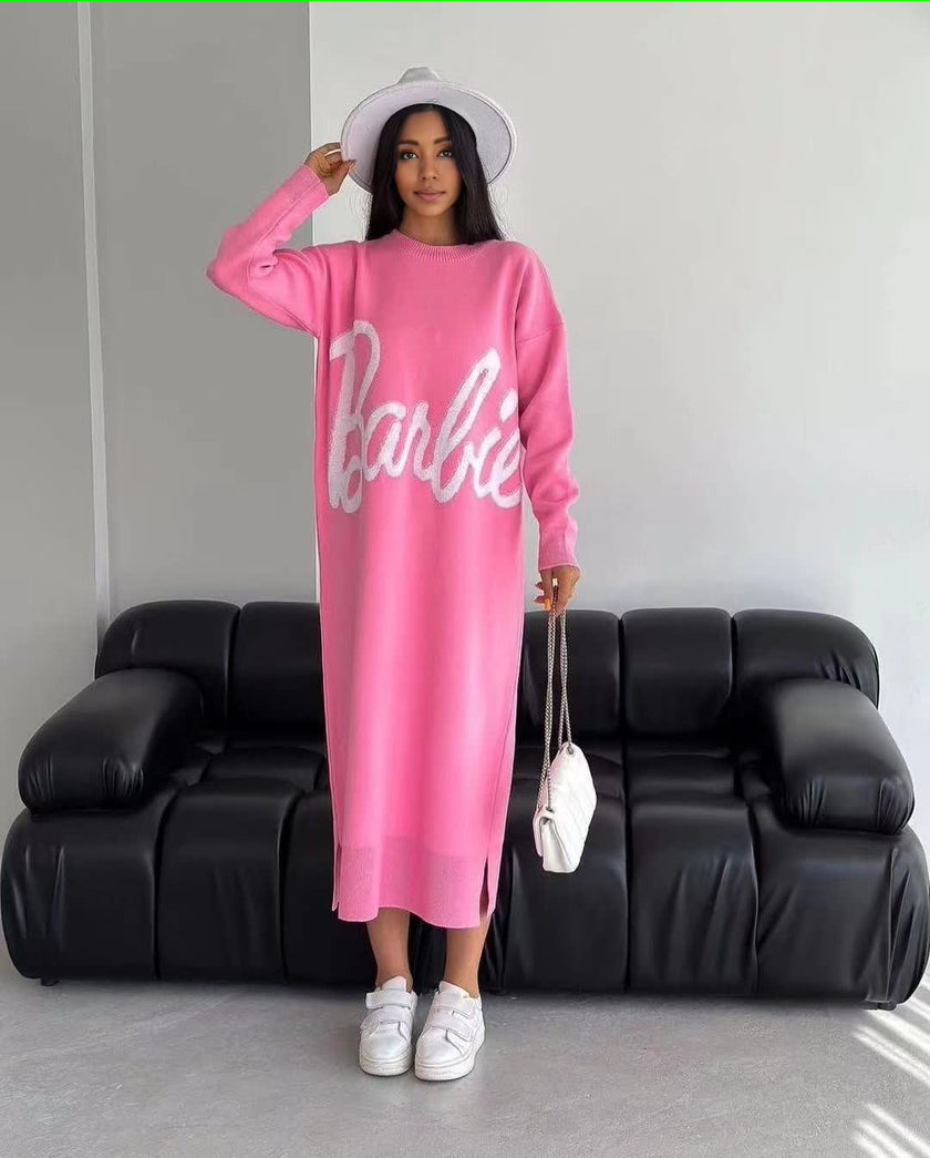 Pink knit maxi dress with long sleeves, round neck, and large script logo