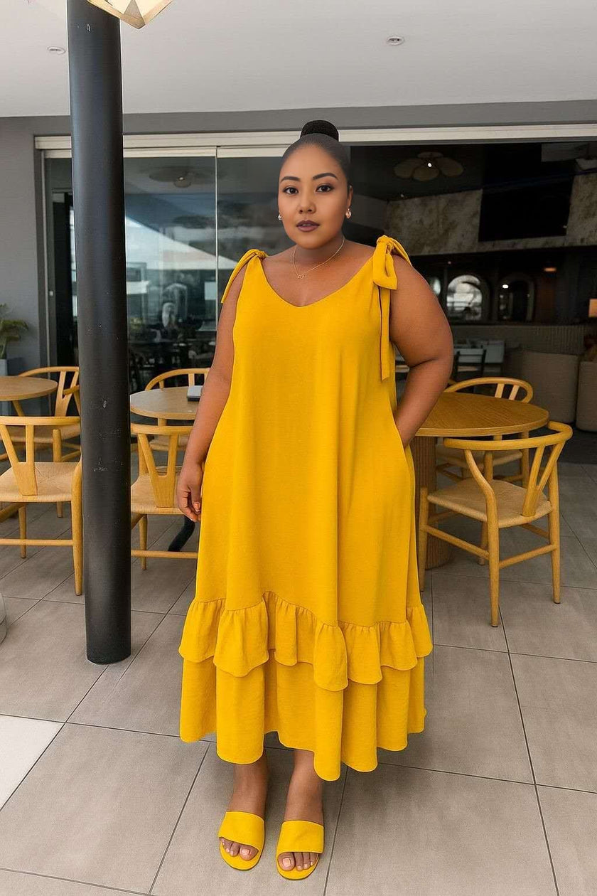 Yellow tiered maxi dress with V-neck and tie shoulder straps